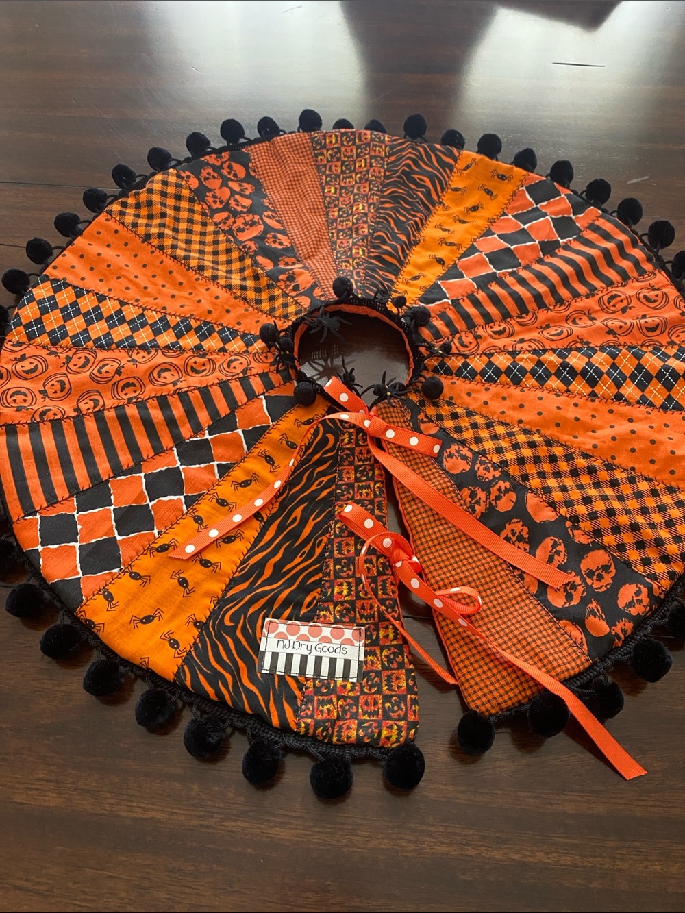 NJ Dry Goods Orange & Black Patchwork Small Tree Skirt with Pom Trim
